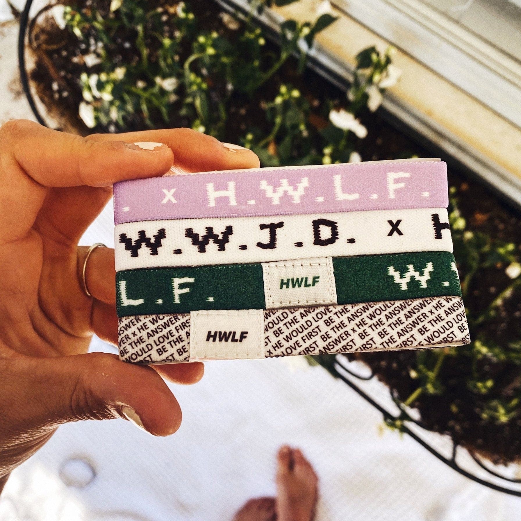 Classic WWJD x HWLF elastic 4-pack in hand